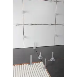 Campanas Tile Level. Caja de 100